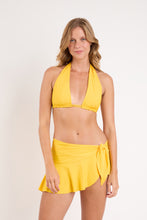 Cargar imagen en el visor de la galería, Model Front: Rio De Sol Jupe De Page Bio-Luz-Solar Mini Skirt
